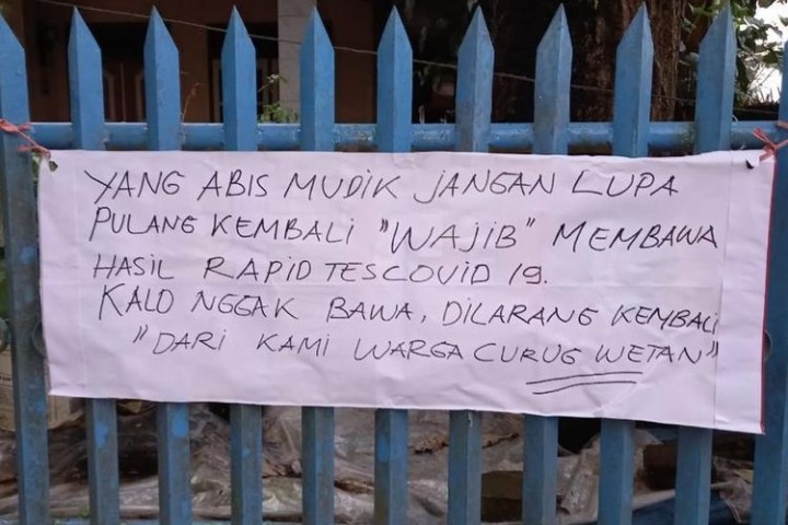 Viral Spanduk Penolakan Pemudik yang Balik Tanpa Surat Bebas Covid-19